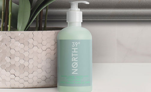 39° North Body Wash with a plant on the background