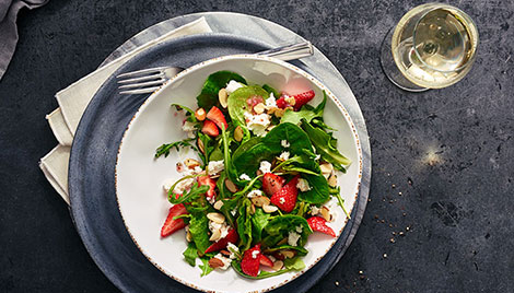 Salad Plates served in a table with salad in it